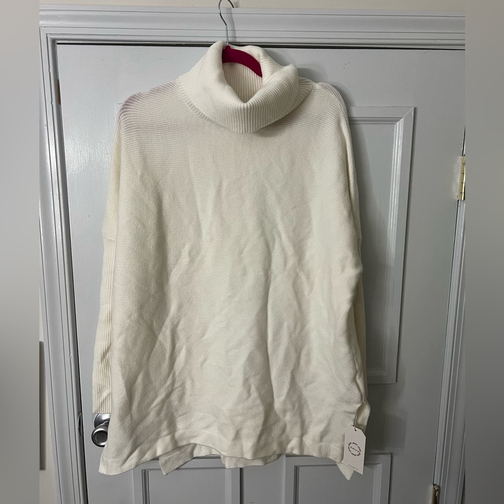 White mock neck tunic sweater
